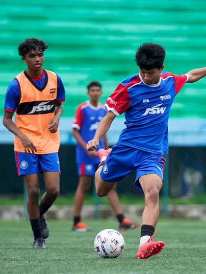 A U19 player strikes the ball with power and technique during training. Our elite programs refine skills to prepare players for the highest levels of competition.