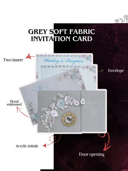 This grey soft fabric invitation card features a door opening, acrylic initials, and floral embossing. It's a beautiful blend of texture and modern design.