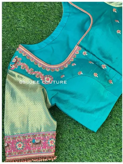 A simpler version of the teal blouse, with embroidery focused on the neckline and the border of the brocade sleeves. This is a great option for a less formal event.