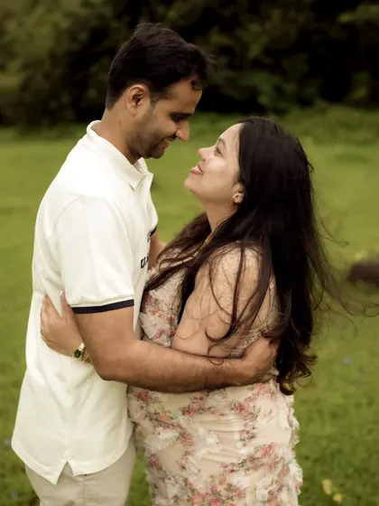 A close-up of the couple embracing, filled with love and laughter. This shot focuses purely on their emotional connection.
