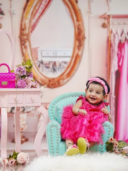Another adorable shot from the pink closet theme, capturing a moment of pure happiness.
