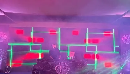 The LED wall displaying a cool grid pattern, ready for the night's festivities.