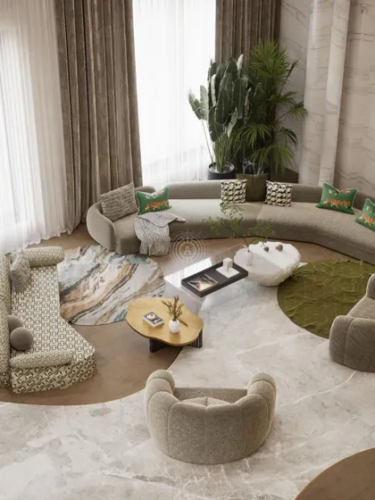 This render shows an overhead view of a spacious living room in a future Kolkata project. The design uses a mix of curved sofas and layered rugs on a mixed marble and wood floor to create distinct, organic seating zones.