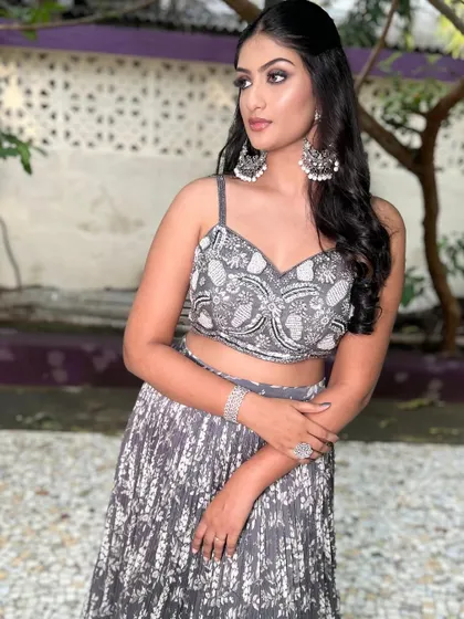 Another angle of the client in the grey Indo-Western lehenga, showing off her elegant pose.