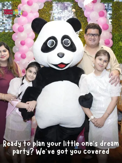 Ready to plan your little one's dream party? This photo with the panda mascot shows we've got you covered.