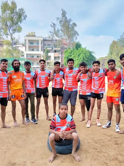 Our team, ready for a match. We train on the mud to build toughness and grit that serves us well on any surface.