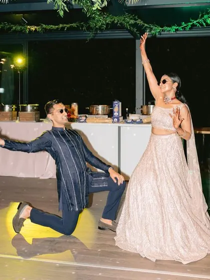 A fun, posed shot from the couple's performance in Italy. We make sure our virtual choreography includes these photo-worthy moments.