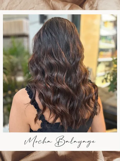 A stunning Mocha Balayage that adds richness and dimension. The deep coffee tones are expertly blended for a seamless, natural-looking result.