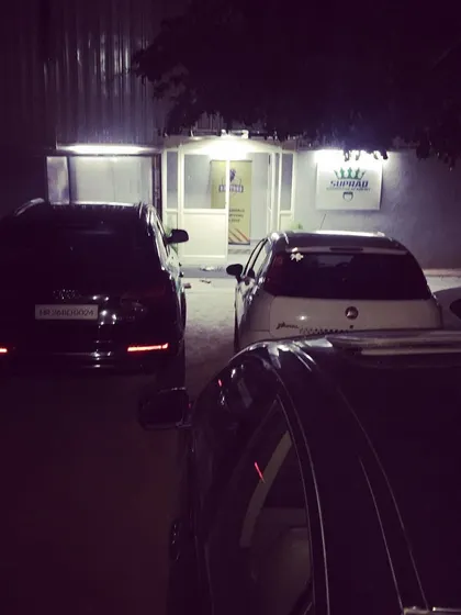 The academy is well-lit and accessible even for evening events. This view shows the parking lot at night, ensuring safety and convenience for late-night games.