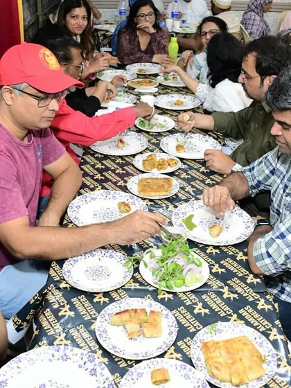 Guests focused on the delicious spread of food on their table.