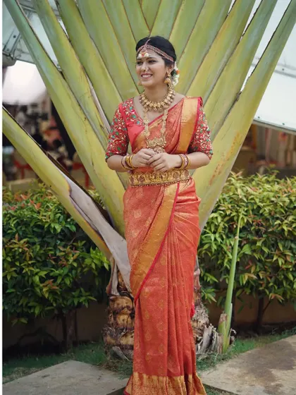 The full bridal attire, showing how our Vaddanam and layered necklaces create a stunning silhouette. This is a complete rental solution for your wedding.