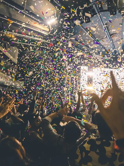 A colorful confetti explosion captures the peak of a party. This is the kind of high-energy moment I create at every event.