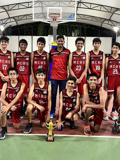 Our U13 boys team posing with their runners-up trophy at the 2023 State Championship tournament.