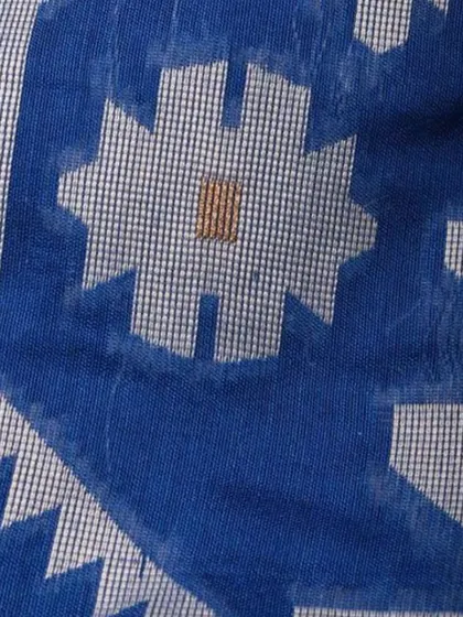A close-up of the beautiful handloom Jamdani cotton fabric I use for some of my custom blouses. The intricate weaving creates a unique texture and pattern.