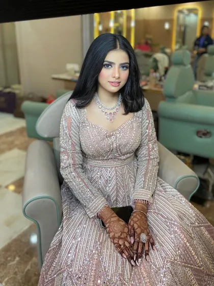 A beautiful portrait of the bride-to-be in our salon chair.