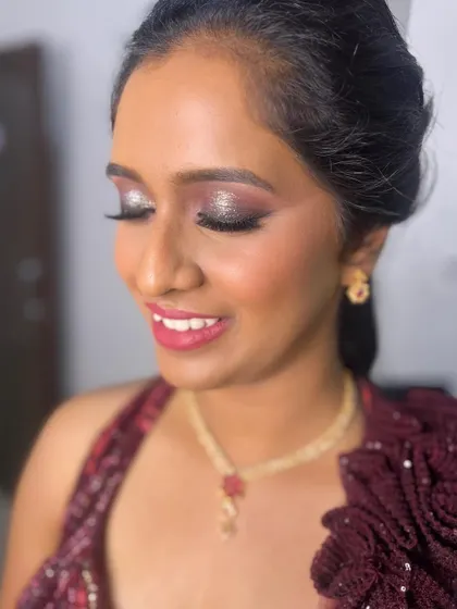 Another angle of this glittery eye makeup look. The silver and charcoal tones create a beautiful, multi-dimensional effect that catches the light.