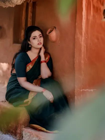 A series of portraits in a rustic, village-like setting. The model's simple green saree and relaxed poses create a feeling of serene, timeless emotion.
