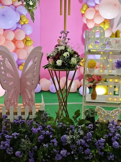 A detailed shot of the decorative ladder shelf and butterfly prop's.