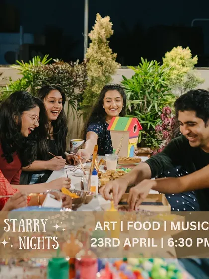 A group of friends and family sharing a laugh while painting together at a Starry Nights event. Our terrace is the perfect backdrop for making memories and masterpieces.