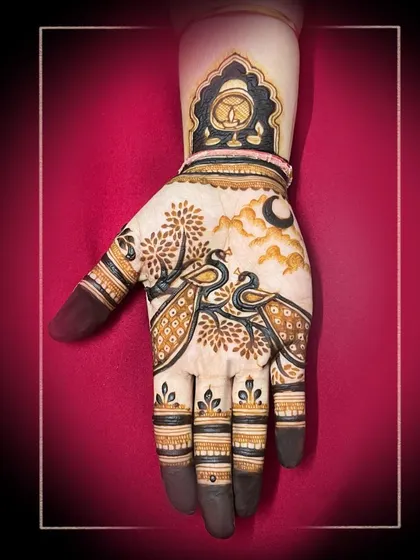 A graceful design featuring two peacocks under the moon. The style is more open and flowing than traditional dense patterns, giving it a modern feel.