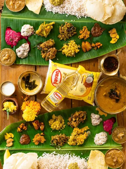 A grand Onam sadya (feast) flatlay, showcasing a multitude of dishes on a banana leaf, with the client's product integrated seamlessly.