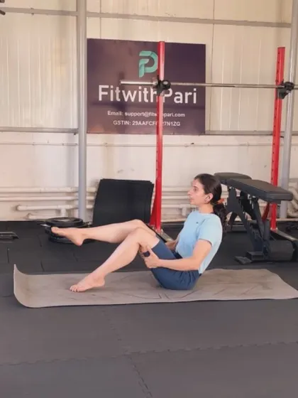 A teaser variation with bent knees. This makes the challenging exercise more accessible for those still building their core strength.