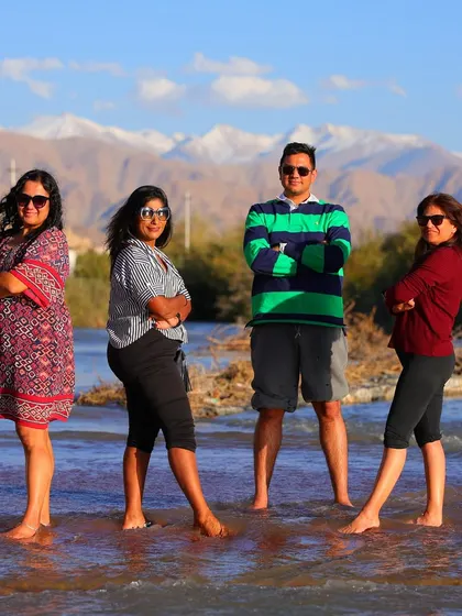 Our team enjoying a well-deserved break, standing together in the river. Recovery is a team activity too.