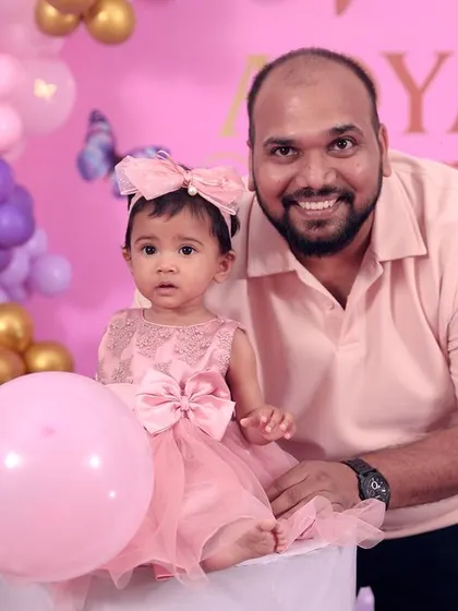 A charming 'Baby Boss' themed birthday party, with a sophisticated black and white color scheme, custom props, and a stylish backdrop, perfect for a little executive.