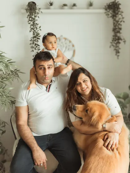 A full family portrait including their furry best friend. My studio is pet-friendly because they are part of the family.