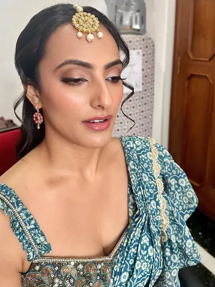 A close-up of the Mehendi makeup, showing the defined eyes and natural-looking skin that is my signature.