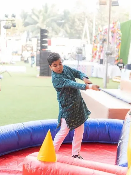Fun and games for everyone. An inflatable gladiator-style game was a huge hit, letting guests of all ages knock out some stress and have a laugh.