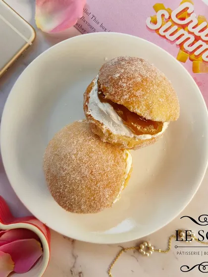 A closer look at the Mango Cream Doughnuts from my Valentine's menu. These are soft baked doughnuts filled with fresh whipped cream and a sweet mango compote.