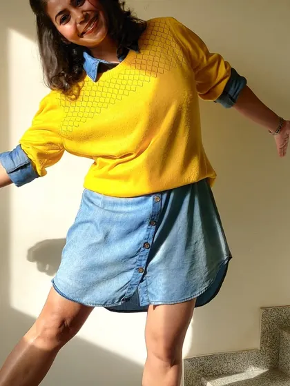 Don't be afraid to have fun with your casual outfits. This layered look is playful, comfortable, and perfect for a relaxed weekend.