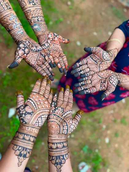 Mehendi is for everyone in the celebration. Here's a look at coordinated designs for the bride's family, ensuring everyone has beautiful henna for the special day.