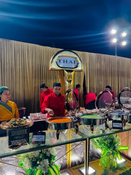 A full view of the live Thai station, showcasing the variety of curries and dishes available.