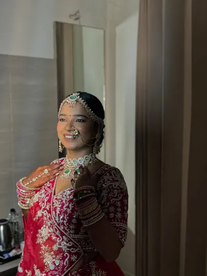 A final portrait showing the bride's confidence and joy. The makeup enhances her natural beauty, making her ready for her big moment.