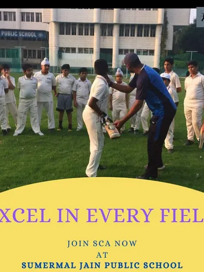 A coach adjusts a young batsman's grip and stance. This personalized attention ensures that every player develops correct and effective techniques from an early age.