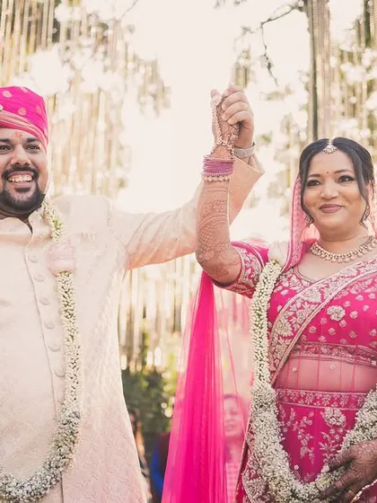 Officially husband and wife. Arjun and Nerrisa celebrate their union with hands raised in joy.