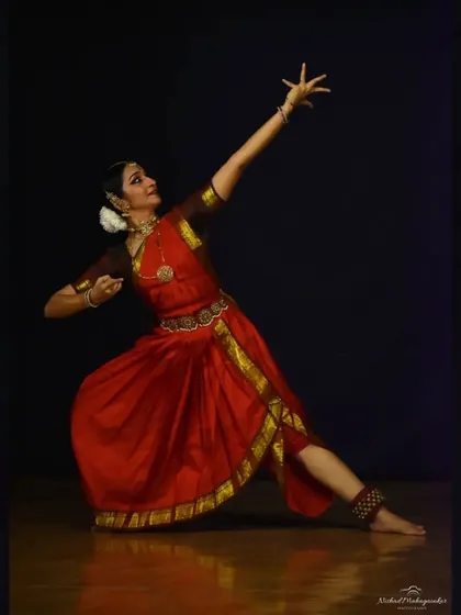 A powerful, angular pose that demonstrates the control and strength required in classical dance. This was from a particularly energetic piece in my solo repertoire.