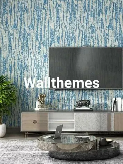 A living room featuring a blue and white wallpaper with a vertical abstract texture, creating a modern and calm atmosphere.