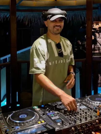A smile from behind the decks at Azora. I'm cooking up something special and getting ready for a great night.