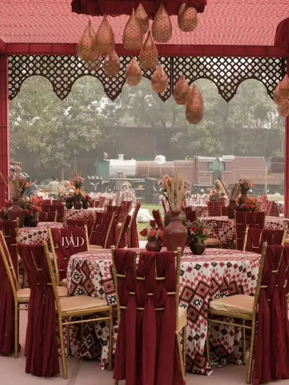 The guest seating at the Souk-themed Mehendi. We used patterned tablecloths, rustic hanging baskets, and traditional chair ties to carry the theme through the entire space.