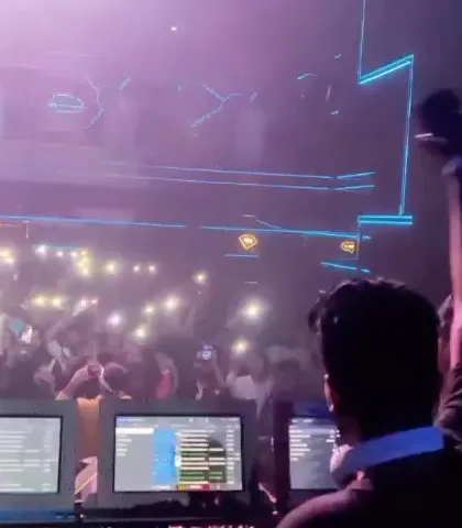 The crowd at F Superclub with their lights up, creating a magical moment during the show with DJ Chetas.
