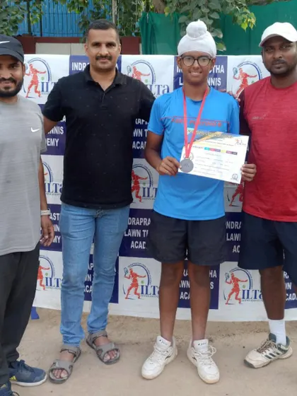 A player receiving his runner-up medal from our coaches. Every tournament is a learning experience that builds a stronger competitor.