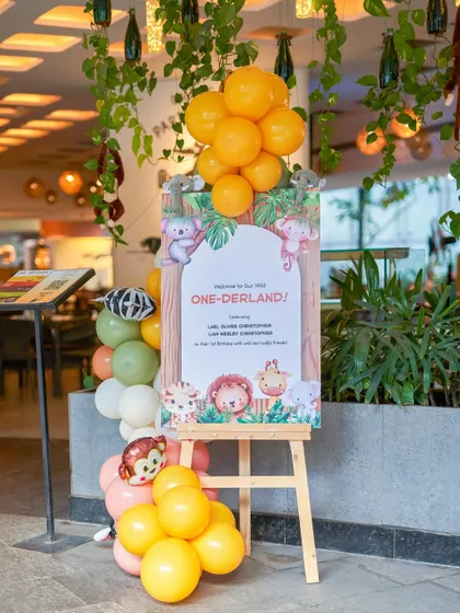 A "One-derland" welcome sign for a jungle-themed party. I create custom signage to greet guests and set the tone from the moment they arrive.