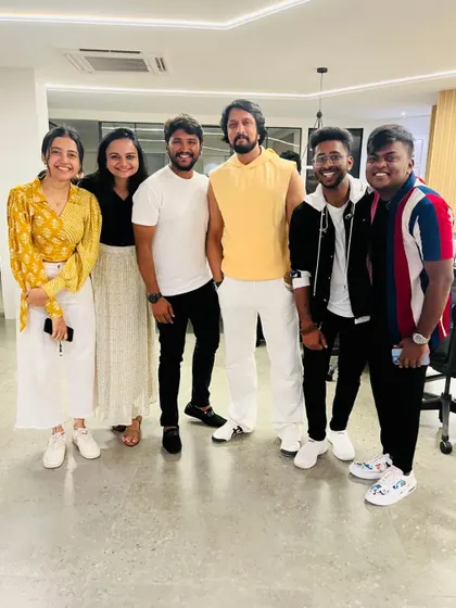 A group picture with Kiccha Sudeep sir and other talented artists after performing at an event. It was a memorable day.