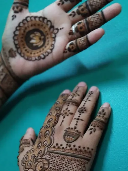 This image shows two different but complementary party designs, one with a mandala and the other with a peacock feather pattern.