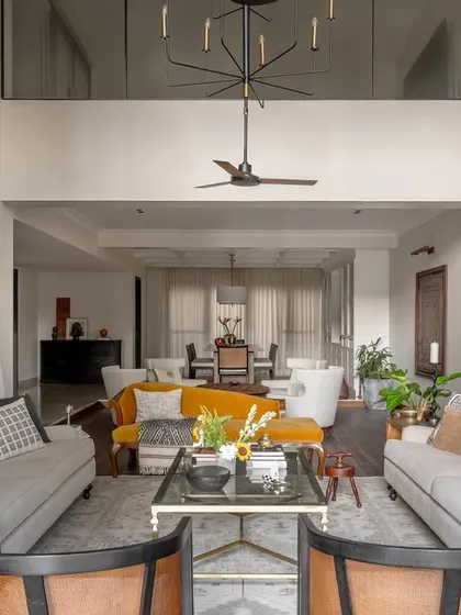 An expansive view of the Rio Home's open-plan living and dining areas. The layout was designed to feel fluid and airy, connecting the large spaces while allowing each to have its own distinct personality and function.