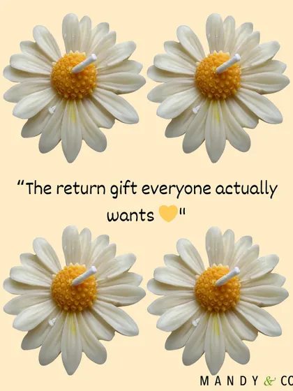 Four of my classic white and yellow daisy candles. This is the return gift that everyone actually wants to receive.