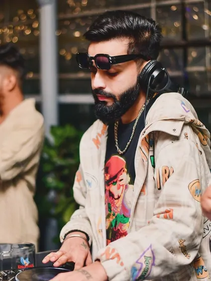 In the middle of the party chaos, this is my zone. Focused on the mix, reading the crowd, and lining up the next track to keep the dance floor on fire.